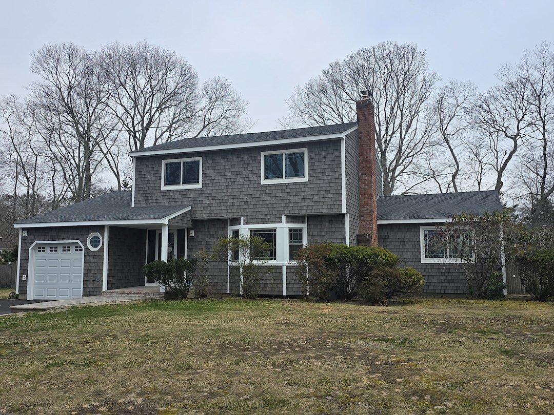 High end cedar vinyl siding project in Bellport, New York